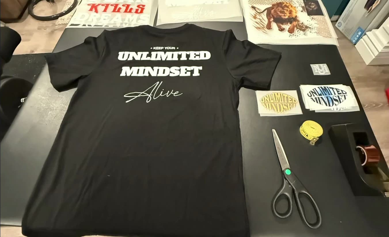 Unlimited Mindset tee laid out during production